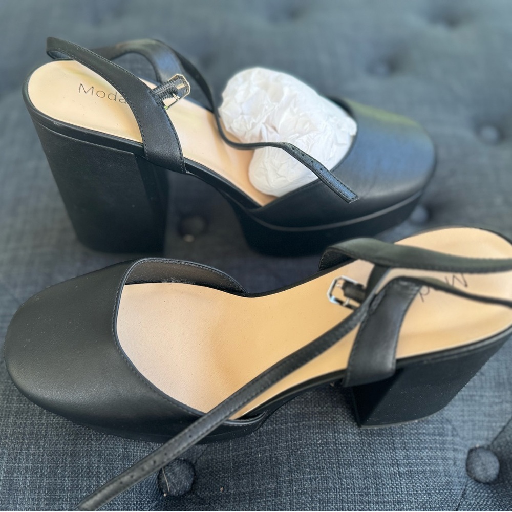 Women’s size 8 platform shoes. Bought two pairs by mistake!